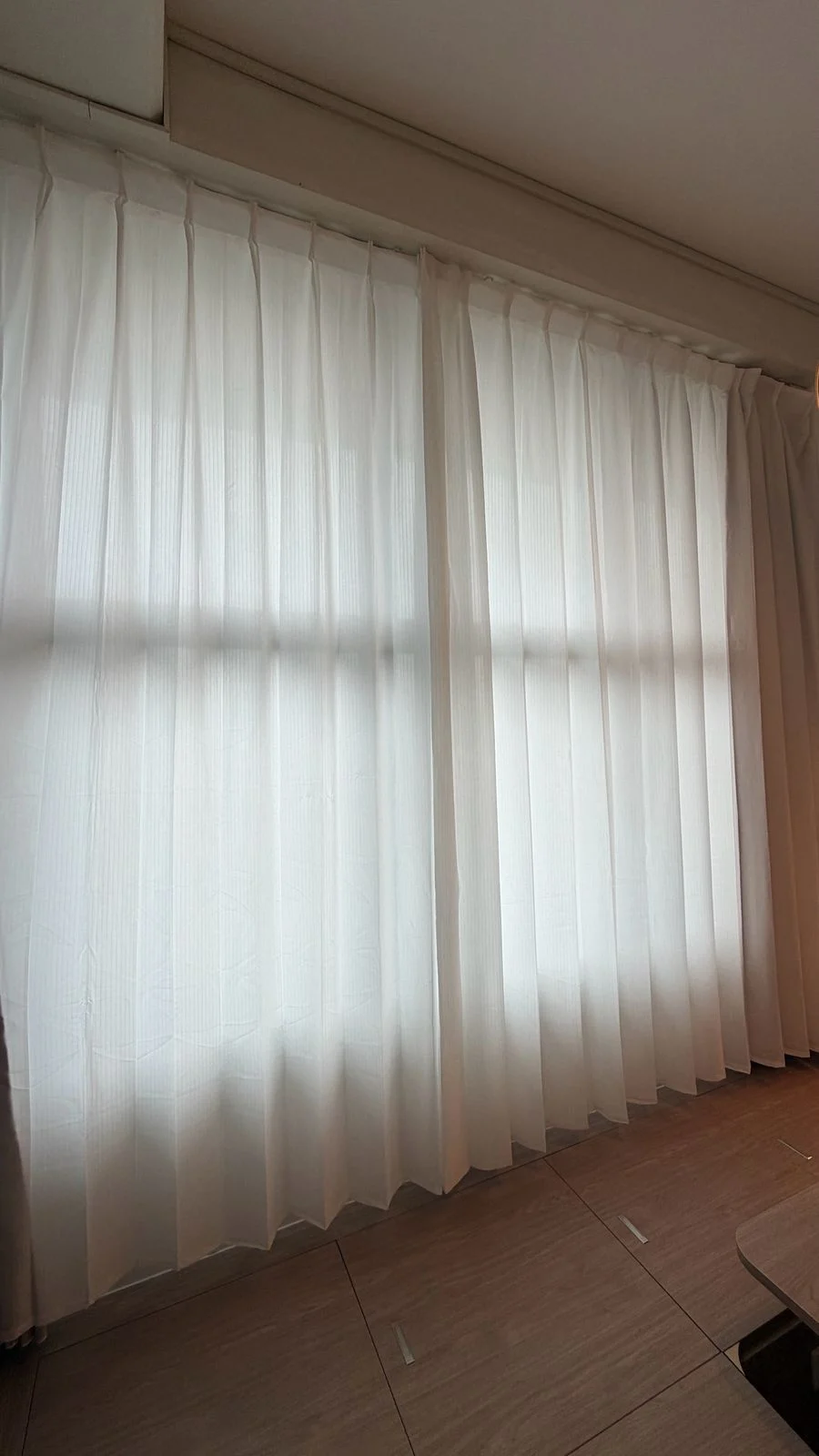 White sheer curtains gently filtering natural light